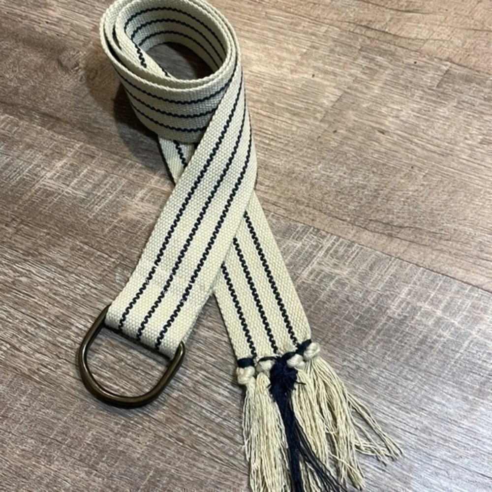 Natural fiber handcrafted loom woven tan and navy belt fits up to 38 inches